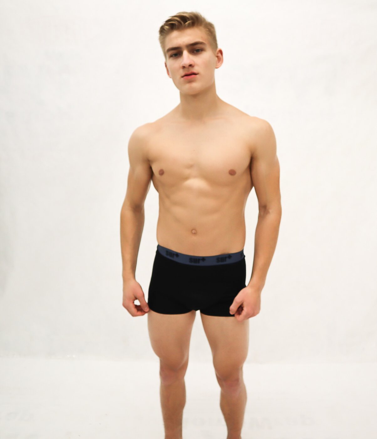 Model wearing black SUR+ boxer underwear